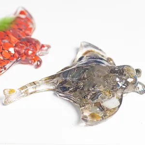 Handmade resin manta ray sculpture filled with natural labradorite crystal stones