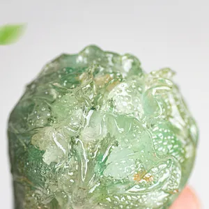 Macro shot of green translucent crystal cabbage ornament showing leaf textures