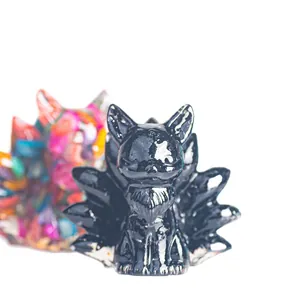 Polished resin Nine-Tailed Fox statues in black and colorful stone patterns