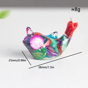 Handcrafted narwhal resin sculpture with colorful crystals in 38mm mini desktop size