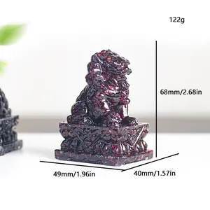 Deep red crystal lion statue on carved base, measuring 68mm height for home decor