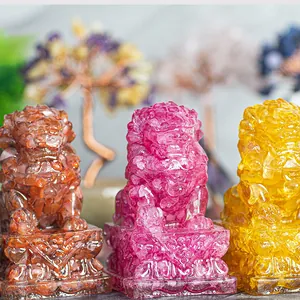 Detailed macro view of translucent resin lion sculptures in red, purple, and gold colors