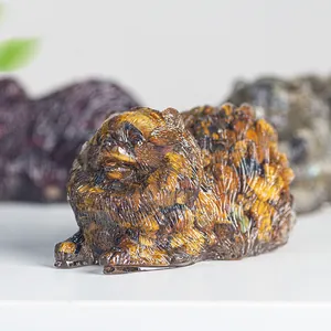Macro shot of Pomeranian resin statue with tiger eye stone texture and fine fur details