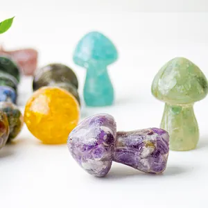 Close-up of resin crystal mushroom sculptures in purple and green with a clear finish