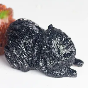 Resin Pomeranian ornament with detailed black faux fur texture and glossy crystal finish