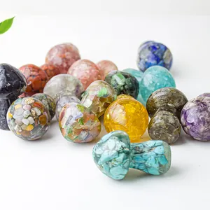 Resin mushroom figurines filled with natural crystals and colorful healing stones