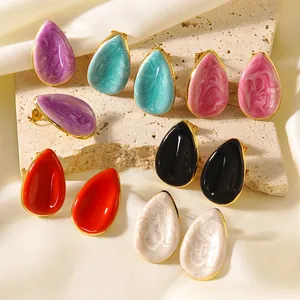 Boucles d'oreilles en émail goutte d'eau avec textures marbrées et bordure dorée