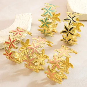 Goldenes Seestern-Armspange aus Edelstahl mit buntem Emaille-Inlay im Set
