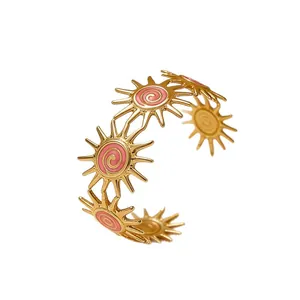 Vintage stainless steel sun cuff bracelet with pink enamel inlay and golden finish
