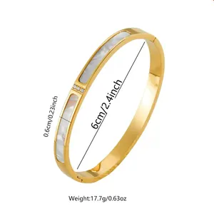 18k gold plated stainless steel rivet bangle with white shell inlay and zircon accents