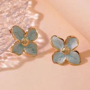 Orecchini a tulipano vintage francesi in smalto azzurro e acciaio al titanio dorato