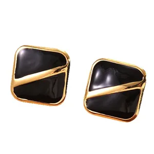 Boucles d'oreilles carrées en émail noir au design géométrique en acier inoxydable doré