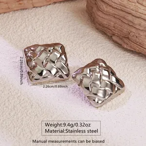 Macro shot of silver woven texture stainless steel earrings with size and weight info