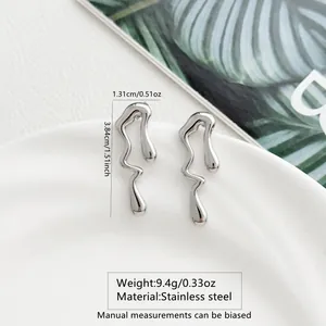 Macro shot of silver lava fluid earrings showing dimensions 3.84cm by 1.31cm and 9.4g weight