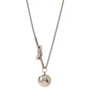 Silver stainless steel snake chain necklace with knot design and metal ball pendant