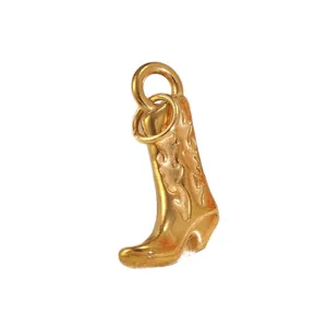 Golden western cowboy boot pendant with detailed floral relief on polished stainless steel