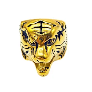 Niche design tiger head ring in golden finish with black enamel details for hip-hop style