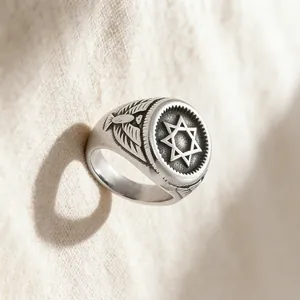 Vintage stainless steel signet ring for men featuring eagle and hexagram engravings