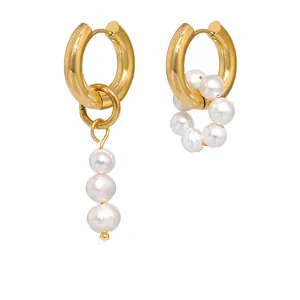 Asymmetric gold titanium earrings with baroque pearls in creative circular designs