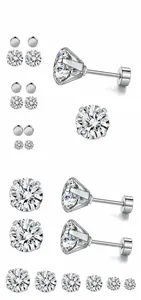 Détail de boucles d'oreilles en zircon rond de différentes tailles avec fermoir à vis