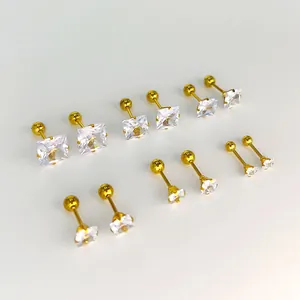 Set de pendientes de acero dorado con circonitas cuadradas y redondas y cierre de rosca