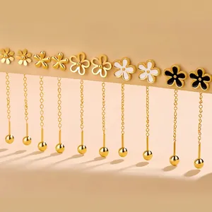 Elegant gold flower tassel chain earrings with floral studs and long metallic fringe