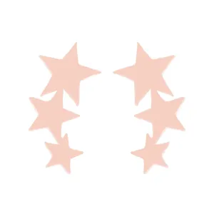 Detail of matte light pink stainless steel stud earrings with triple star alignment