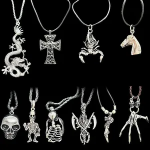 Gothic punk style silver alloy necklaces with skull dragon and cross pendants on black background