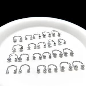 Polished silver horseshoe piercing set with geometric beads and crystal zirconia studs