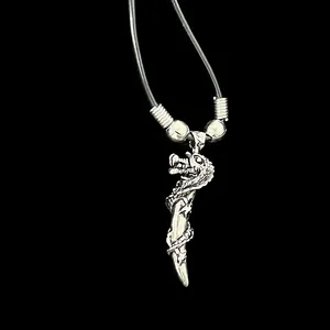 Silver dragon pendant necklace with gothic punk details on a black cord