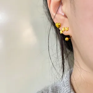 Conjunto de pendientes de corazón y estrella dorados para múltiples perforaciones
