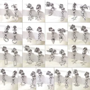 Selection of 16 minimalist stainless steel stud earrings in silver stars and hearts