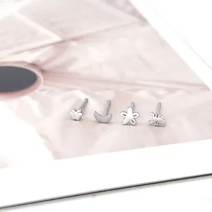 Silver stainless steel nose studs featuring butterfly moon flower and scorpion shapes