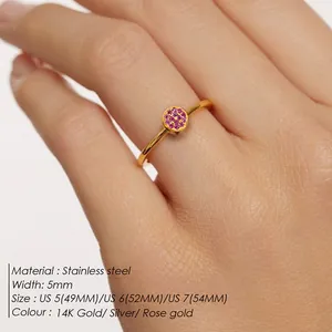 Close-up of 5mm stainless steel ring with pink pave zircon on model hand