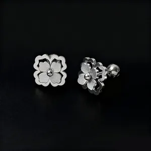 Elegant silver four-leaf clover stud earrings with matte finish and secure screw backings