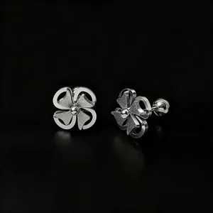 Frosted silver four-leaf clover stud earrings with threaded post and polished finish