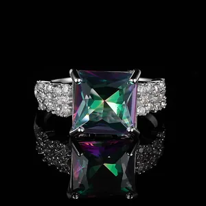 Elegant silver ring with a large square rainbow mystic topaz and side pavé diamonds