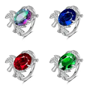 Luxurious branch ring set with large oval gemstones in multiple colors and gold plating