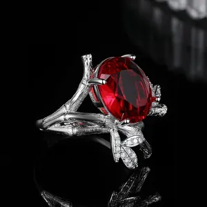 Luxury oval red ruby ring with natural branch design and sparkling zircon leaves