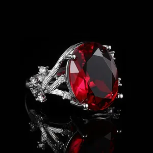 Vintage silver branch ring featuring a large oval red ruby and white accent stones
