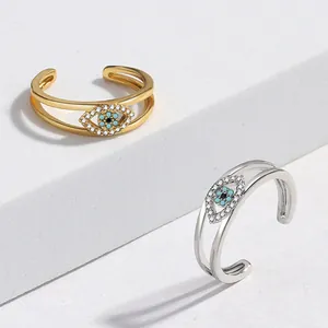 Adjustable Evil Eye ring in gold and silver finish with sparkling crystal embellishments