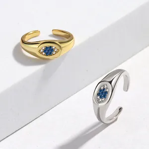 Adjustable evil eye ring with blue zircon stones in gold and silver plating