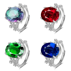 Adjustable floral leaf ring with large oval sapphire and crystals in four colors