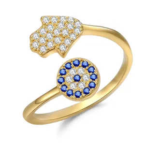 Gold Hamsa Hand and Evil Eye open ring with blue and white pavé zircon stones