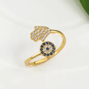 Macro detail of Hamsa Hand and Evil Eye open ring with sparkling crystal inlay