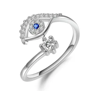 Silver evil eye open ring with blue stone and sparkling cubic zirconia stones