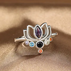 Elegant silver lotus ring with purple marquise gemstone and colorful zircon accents