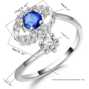 Macro view of evil eye olive branch ring with blue zircon and silver plated brass detail