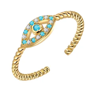 Anillo ajustable de oro ojo turco con cristales azules y diseño de banda trenzada