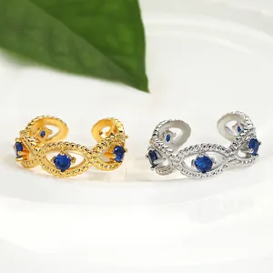 Adjustable evil eye ring in gold and silver finish with blue crystal and beaded band